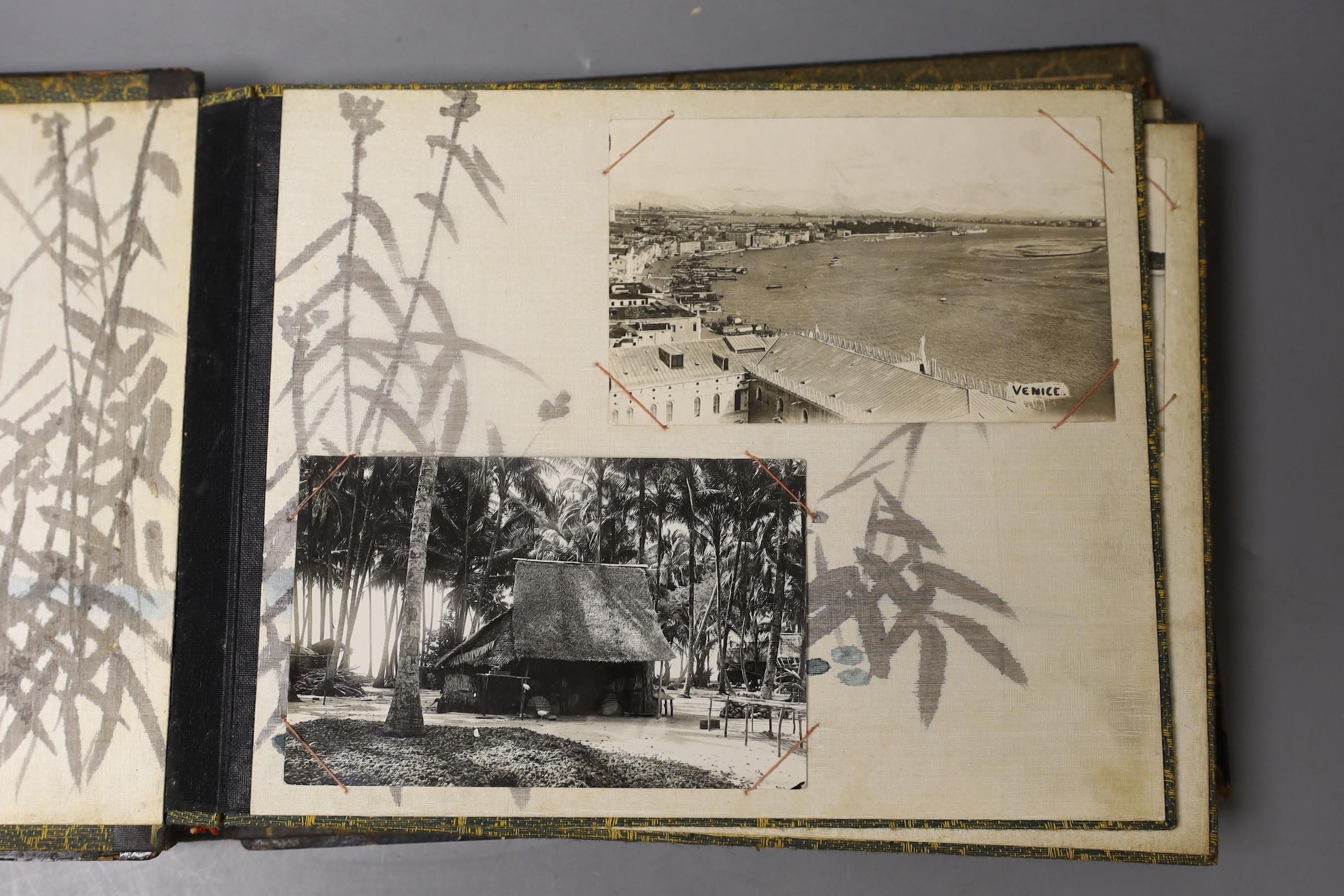 A black lacquer album containing photos of Venice, Penang and China